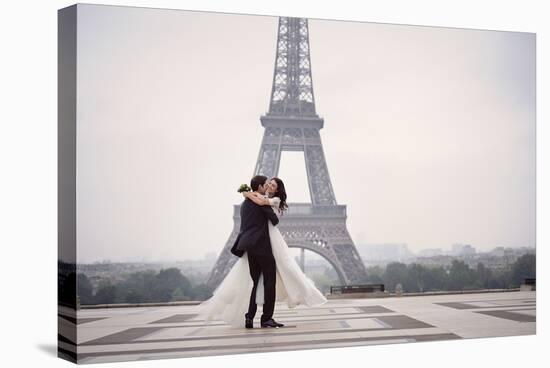 Bride & Groom at Eiffel Tower-null-Stretched Canvas