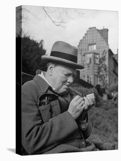 Britain's Prime Minister Winston Churchill Lighting a Cigar-null-Premier Image Canvas