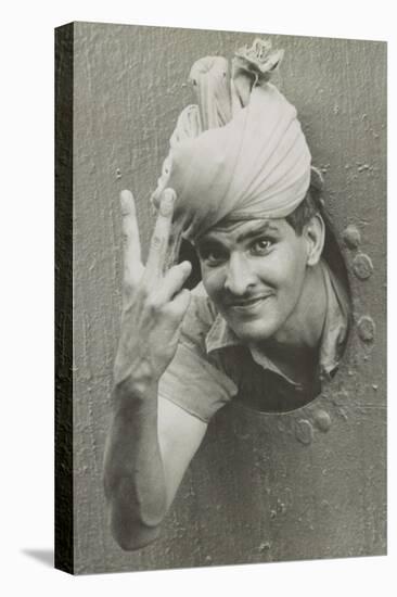 British Indian Soldier He Gives the 'V' Sign from a Port-Hole of a Ship on Arrival in Singapore-null-Stretched Canvas