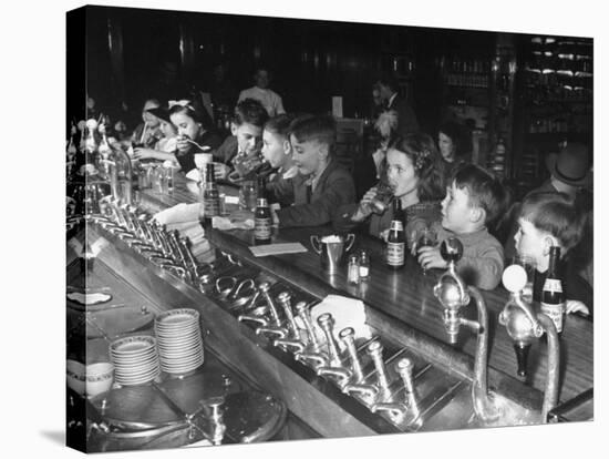 British Refugee Children Eating Ice Cream and Drinking Ginger Ale at a Soda Fountain-John Phillips-Premier Image Canvas