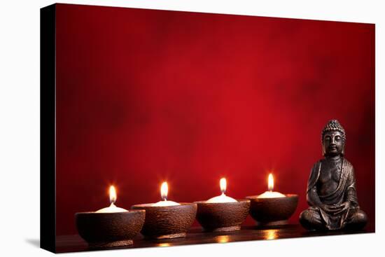 Buddha and Candles on Red Background, Religious Concept.-Sofiaworld-Premier Image Canvas