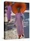 Buddhist Nuns with Bamboo-Framed Orange Umbrellas Walk Through Streets of Sittwe, Burma, Myanmar-Nigel Pavitt-Premier Image Canvas