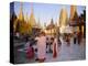 Buddhist Worshippers at the Shwedagon Paya (Shwe Dagon Pagoda), Yangon (Rangoon), Myanmar (Burma)-Christina Gascoigne-Premier Image Canvas