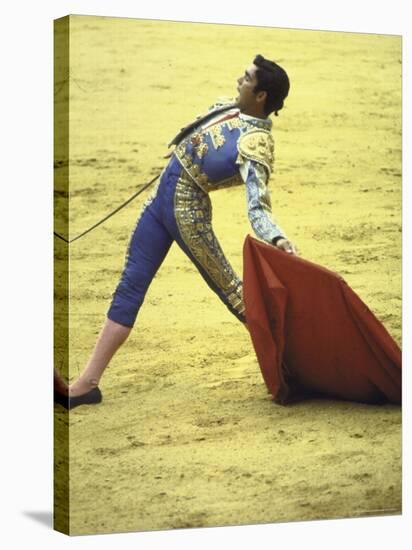 Bullfighter Francisco Ribera, Known as "Paquirri," Leaning Back in the Ring-Loomis Dean-Premier Image Canvas