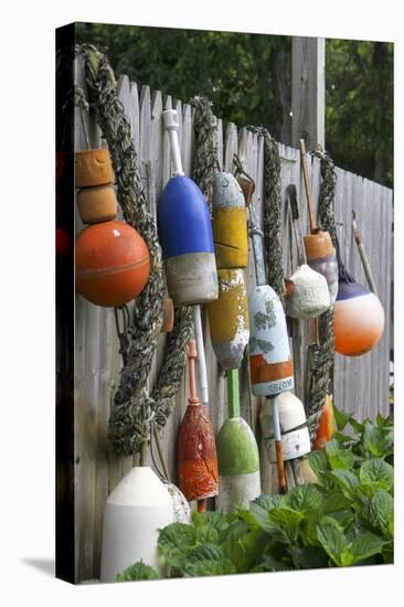 Buoys outside Lucy J's Jewelry and Glass Studio, Eastham, Cape Cod, Massachusetts, USA-Susan Pease-Premier Image Canvas