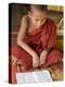 Burma, Lake Inle, A Young Novice Monk Learning at a Monastery School on Lake Inle, Myanmar-Nigel Pavitt-Premier Image Canvas