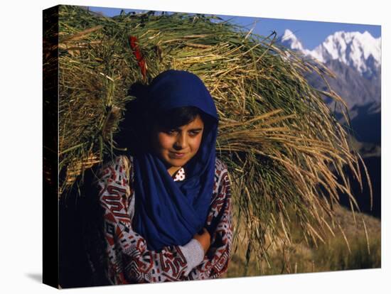 Burusho Girl Returns Home with Fodder for Her Livestock in the Hunza Valley-Amar Grover-Premier Image Canvas