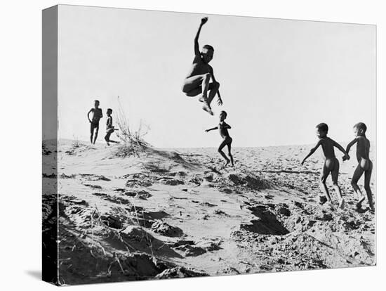 Bushman Children Playing Games on Sand Dunes-Nat Farbman-Premier Image Canvas