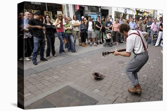 Busker Entertaining the Crowds, Galway, County Galway, Connacht, Republic of Ireland-Gary Cook-Premier Image Canvas