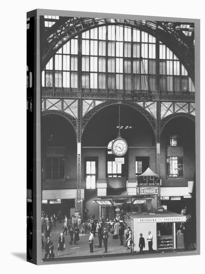 Bustling Interior Showing Digital and Standard Clocks and Ironwork Arches of Penn Station-Walker Evans-Premier Image Canvas