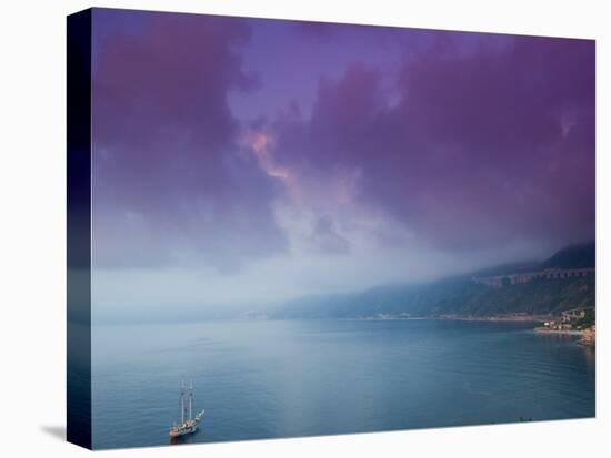 Calabrian Sunset and Sailboat, Strait of Messina, Scilla, Calabria, Italy-Walter Bibikow-Premier Image Canvas