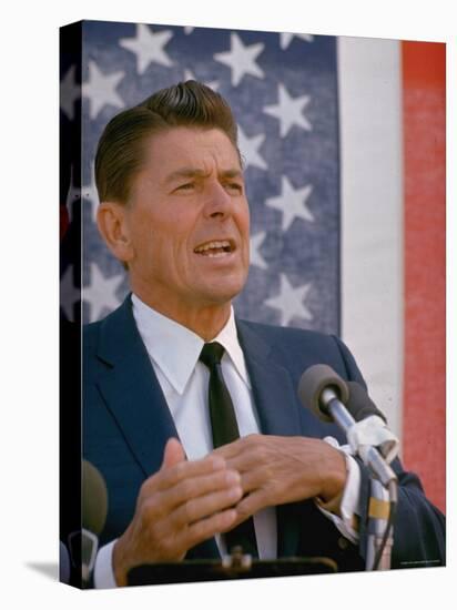 California Gubernatorial Candidate Ronald Reagan Speaking in Front of American Flag Backdrop-Bill Ray-Premier Image Canvas