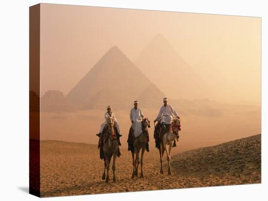 Camel Riders at Giza Pyramids, UNESCO World Heritage Site, Giza, Cairo, Egypt, North Africa, Africa-null-Premier Image Canvas