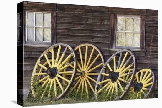 Canada, British Columbia, Barkerville. Wagon wheels.-Jaynes Gallery-Premier Image Canvas