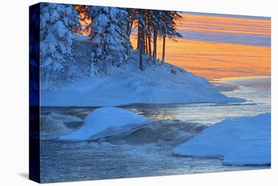 Canada, Manitoba, Sasagiu Rapids. Sunset on Setting Lake in winter.-Jaynes Gallery-Premier Image Canvas