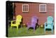 Canada, Peggy's Cove, Nova Scotia, Barn with Colorful Adirondack Chairs with Flowers-Bill Bachmann-Premier Image Canvas