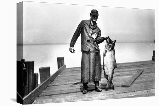 Cannery Worker with Salmon, Circa 1909-Asahel Curtis-Premier Image Canvas