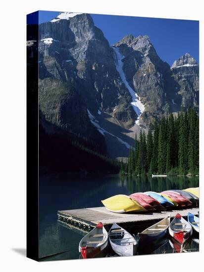 Canoes for Hire on Shore of Moraine Lake, Alberta, Canada-Ruth Tomlinson-Premier Image Canvas