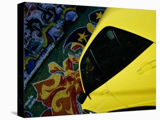 Car Parked by Graffiti Filled Wall-null-Premier Image Canvas