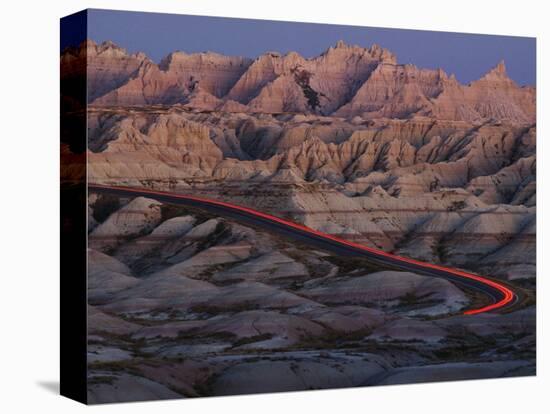 Car Traveling Through Badlands National Park-Layne Kennedy-Premier Image Canvas