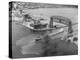 Cargo Boat Passing under Bridge-Charles Rotkin-Premier Image Canvas