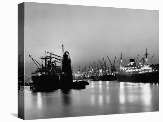Cargo Ships in the Harbor-Dmitri Kessel-Premier Image Canvas