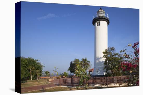 Caribbean, Puerto Rico, Rincon. Scenic with lighthouse.-Jaynes Gallery-Premier Image Canvas