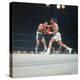 Cassius Clay, aka Muhammad Ali Throwing Famous "Phantom Punch"-George Silk-Premier Image Canvas