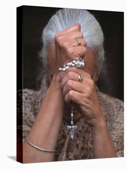 Catholic Woman Prays Holding Her Rosary-null-Premier Image Canvas