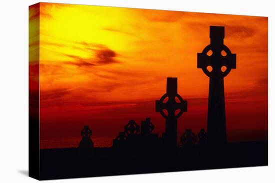 Celtic Crosses Silhouetted at Sunset-Carl Purcell-Premier Image Canvas