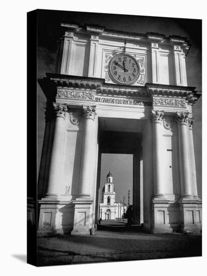 Cement Archway Featuring a Clock over the Entrance to the Grounds of the Greek Orthodox Church-Margaret Bourke-White-Premier Image Canvas