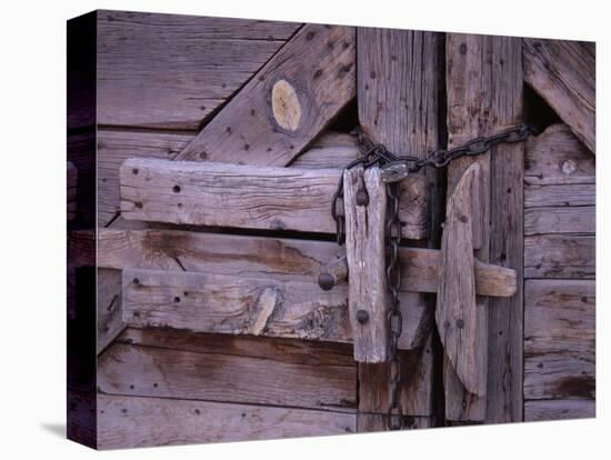 Chains and Lock on Weathered Barn Door-Mick Roessler-Premier Image Canvas