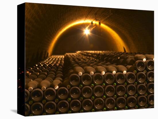 Champagne Bottles in Vaulted Cellar, Champagne Deutz, Ay, Vallee De La Marne, Ardennes, France-Per Karlsson-Premier Image Canvas