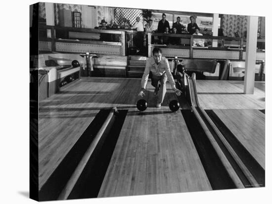 Champion Bowler Andy Varipapa Demonstrating Favorite Trick of Rolling Two Balls Down Alley at once-Gjon Mili-Premier Image Canvas