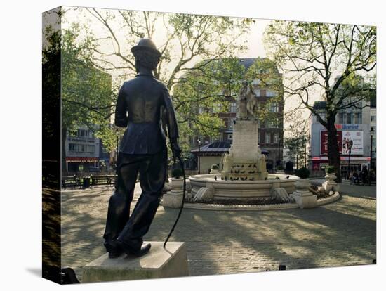 Chaplin Statue and Leicester Square, London, England, United Kingdom-Adam Woolfitt-Premier Image Canvas