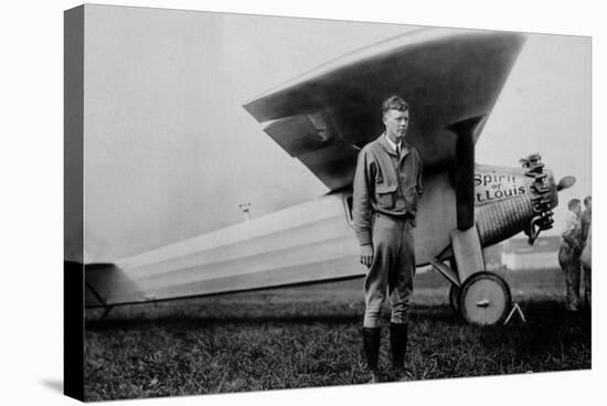 Charles Lindbergh (1902-1974) American Aviator in Front of His Plane Spirit of Saint Louis-null-Stretched Canvas