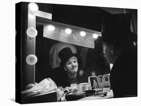 Charlie Chaplin Looking Into Mirror, Putting on Makeup for Role as the Animal Trainer-W^ Eugene Smith-Premier Image Canvas