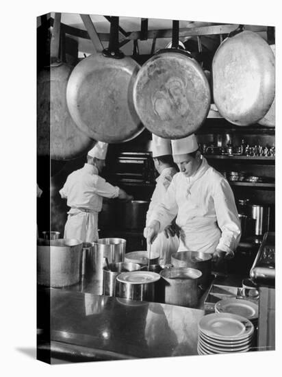 Chefs Cooking in a Restaurant Kitchen at Radio City-Bernard Hoffman-Premier Image Canvas