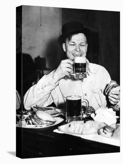 Chicago Worker Enjoys a Saloon Lunch That Provided Free Food to Go with the Purchased Beer, ca 1920-null-Stretched Canvas