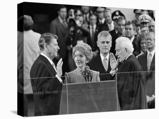 Chief Justice Warren Burger Administers the Oath of Office to Ronald Reagan, January 20, 1981-null-Premier Image Canvas