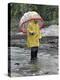 Child in Rain Gear with Umbrella Playing in Puddle.-Nora Hernandez-Premier Image Canvas