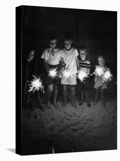 Children Holding Sparklers on a Beach-Lisa Larsen-Premier Image Canvas