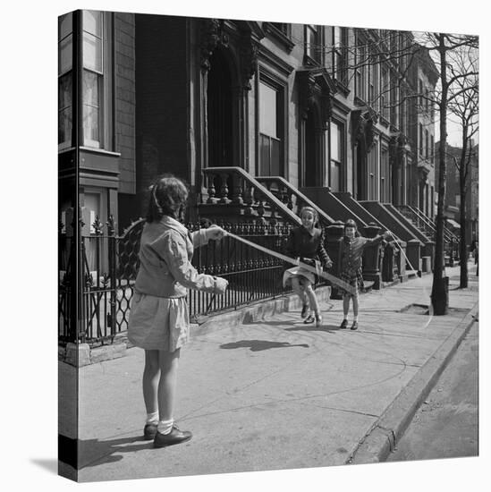 Children Jump Roping on Sidewalk Next to Brooklyn Brownstones, NY, 1949-Ralph Morse-Premier Image Canvas