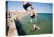 Children Jumping into the Sea from Stone Jetty-Felipe Rodriguez-Premier Image Canvas