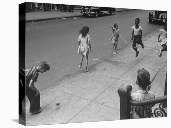Children Jumping Rope on Sidewalk-Ed Clark-Premier Image Canvas