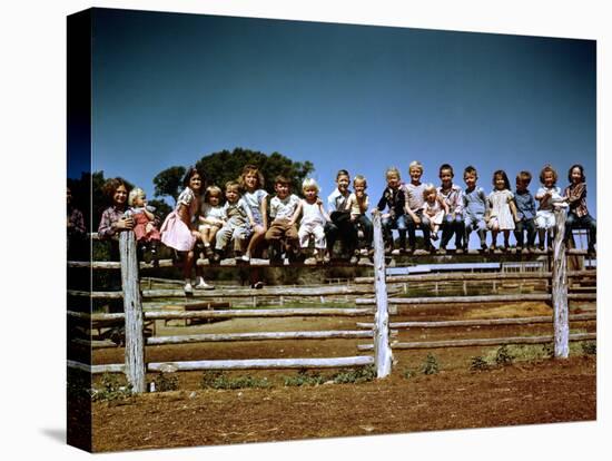 Children of Rancher Tom Hall Lined up on Fence-Loomis Dean-Premier Image Canvas