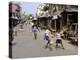 Children Play Soccer on One of the Streets of the Business District of Lagos-null-Premier Image Canvas