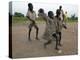 Children Play with Homemade Soccer Balls Made from Discarded Medical Gloves-null-Premier Image Canvas