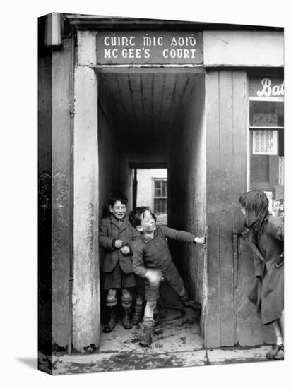 Children Playing at the Entrance to McGee's Court Slum on Camden Street-Tony Linck-Premier Image Canvas