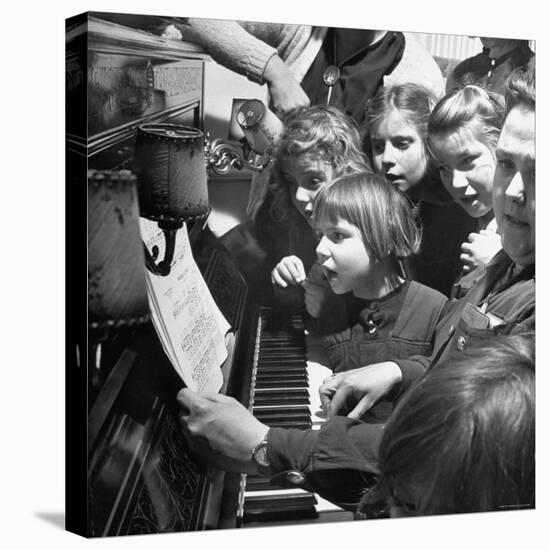 Children Singing Around the Piano at Orphanage-Tony Linck-Premier Image Canvas